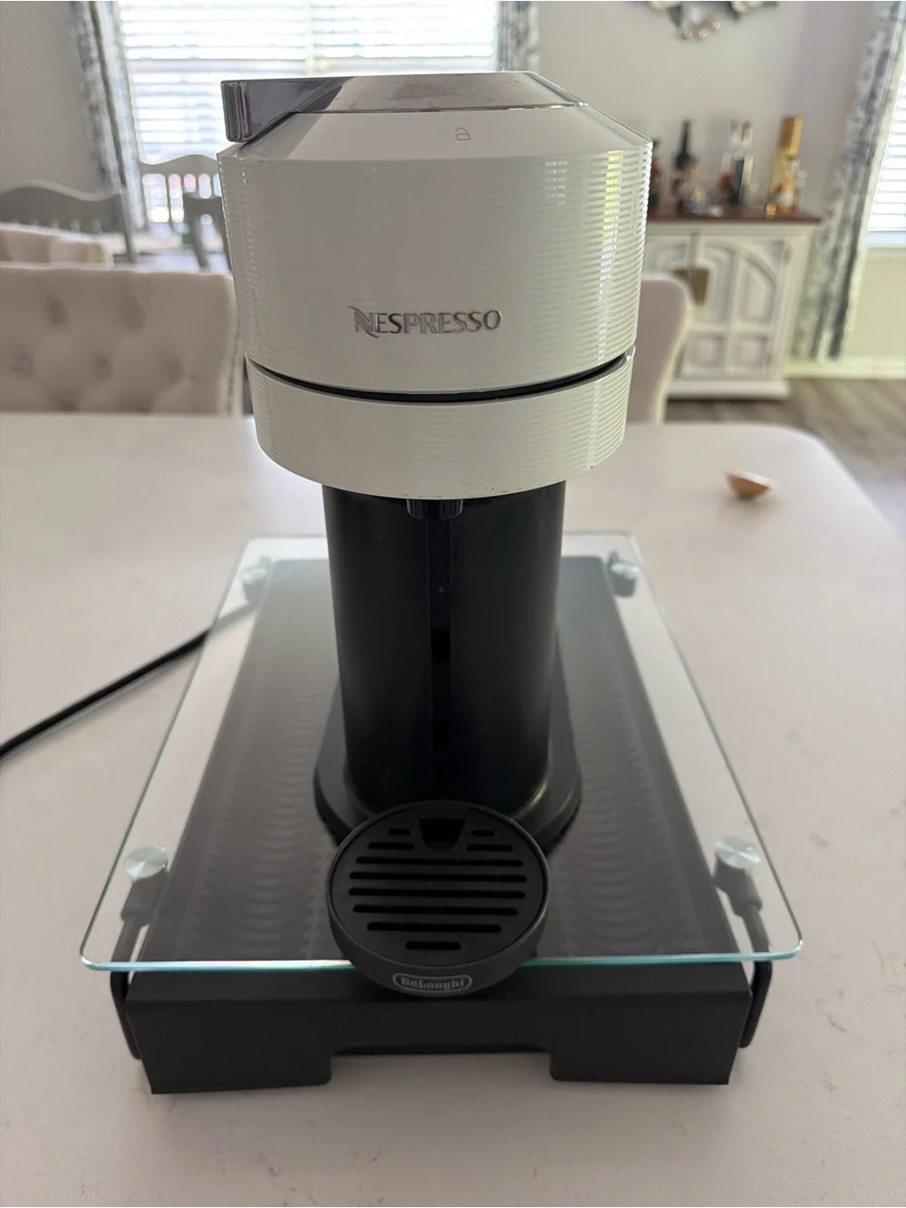 Nespresso Capsule Espresso Machine in White and Black & pod holder